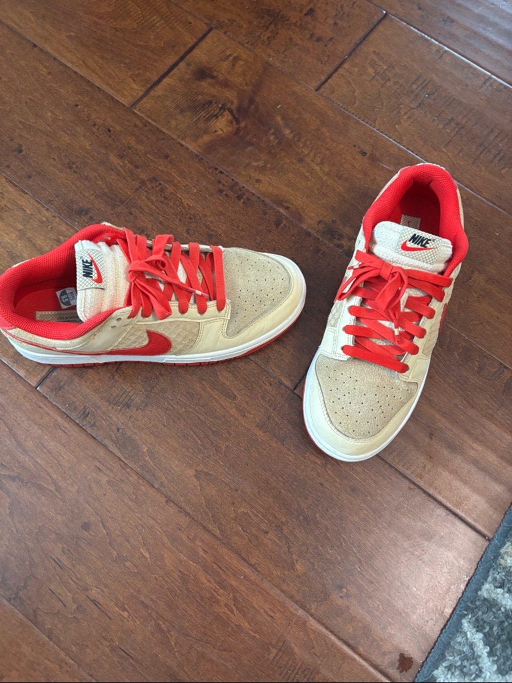 Nike Beige Suede Sneakers with Red Accents